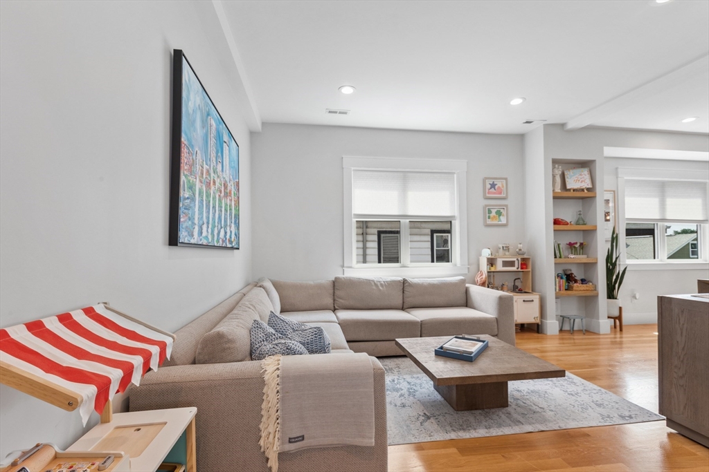 340 Main Street Everett, MA 02149 - Photo 16 of 42 a living room with furniture and a couch