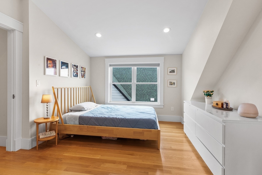 340 Main Street Everett, MA 02149 - Photo 24 of 42 a bedroom with a bed and a window