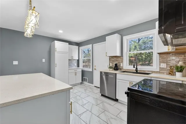 $434,000 | 9234 Woodson Drive, Overland Park, KS 66207