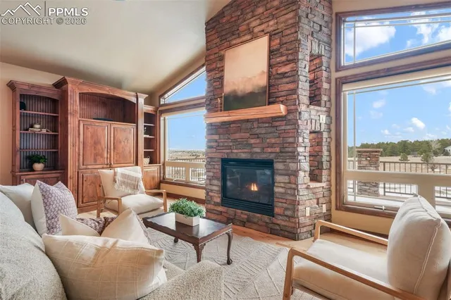 a kitchen with stainless steel appliances granite countertop a stove and a large countertops with cabinets