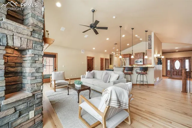 a kitchen with counter top space a sink appliances and cabinets