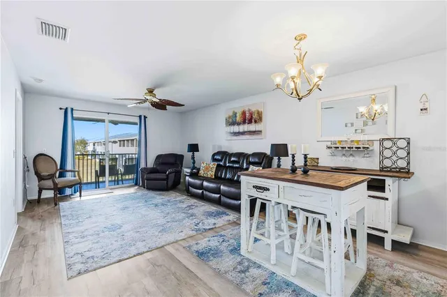 a kitchen with a sink cabinets and window