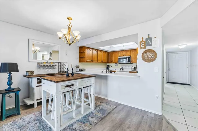 a bathroom with a sink a mirror and a shower
