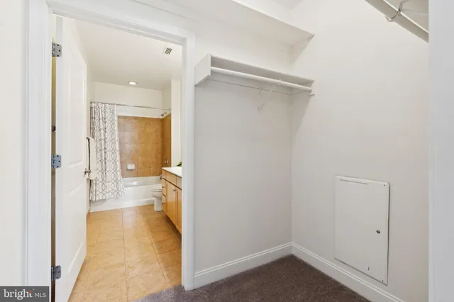 a view of a bathroom from a hallway