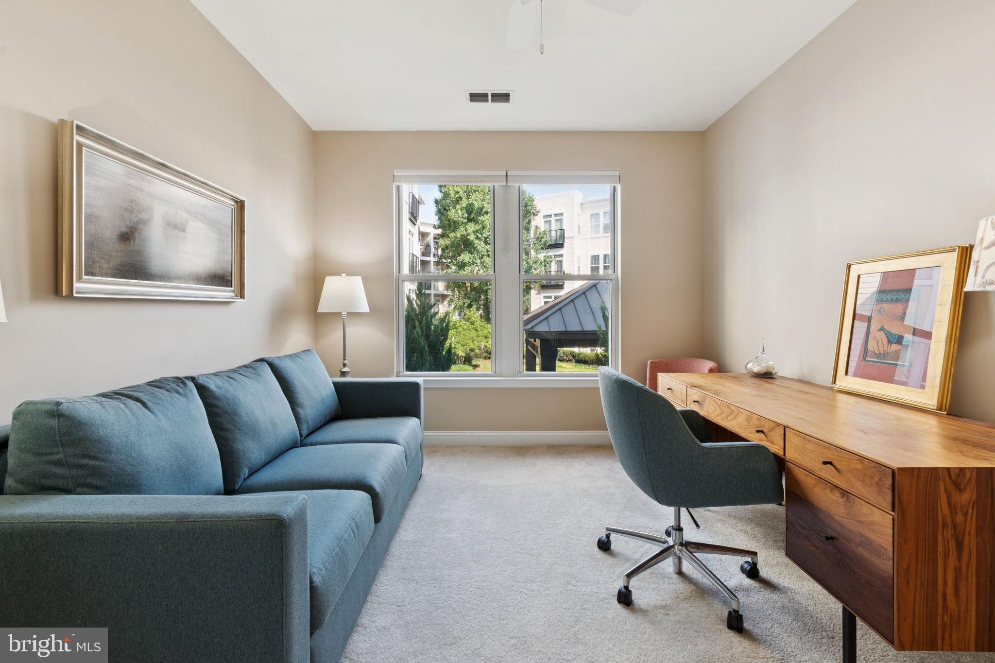 1391 Pennsylvania Ave. Southeast, Unit 352 Washington, DC 20003 - Photo 23 of 43 a work room with furniture and a window