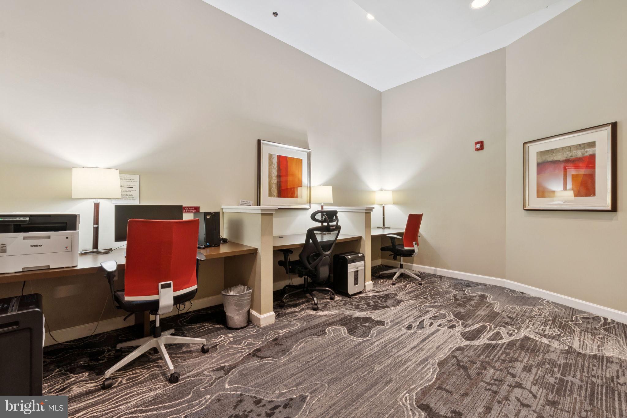 1391 Pennsylvania Ave. Southeast, Unit 352 Washington, DC 20003 - Photo 32 of 43 a living room with furniture a computer on desk and chair