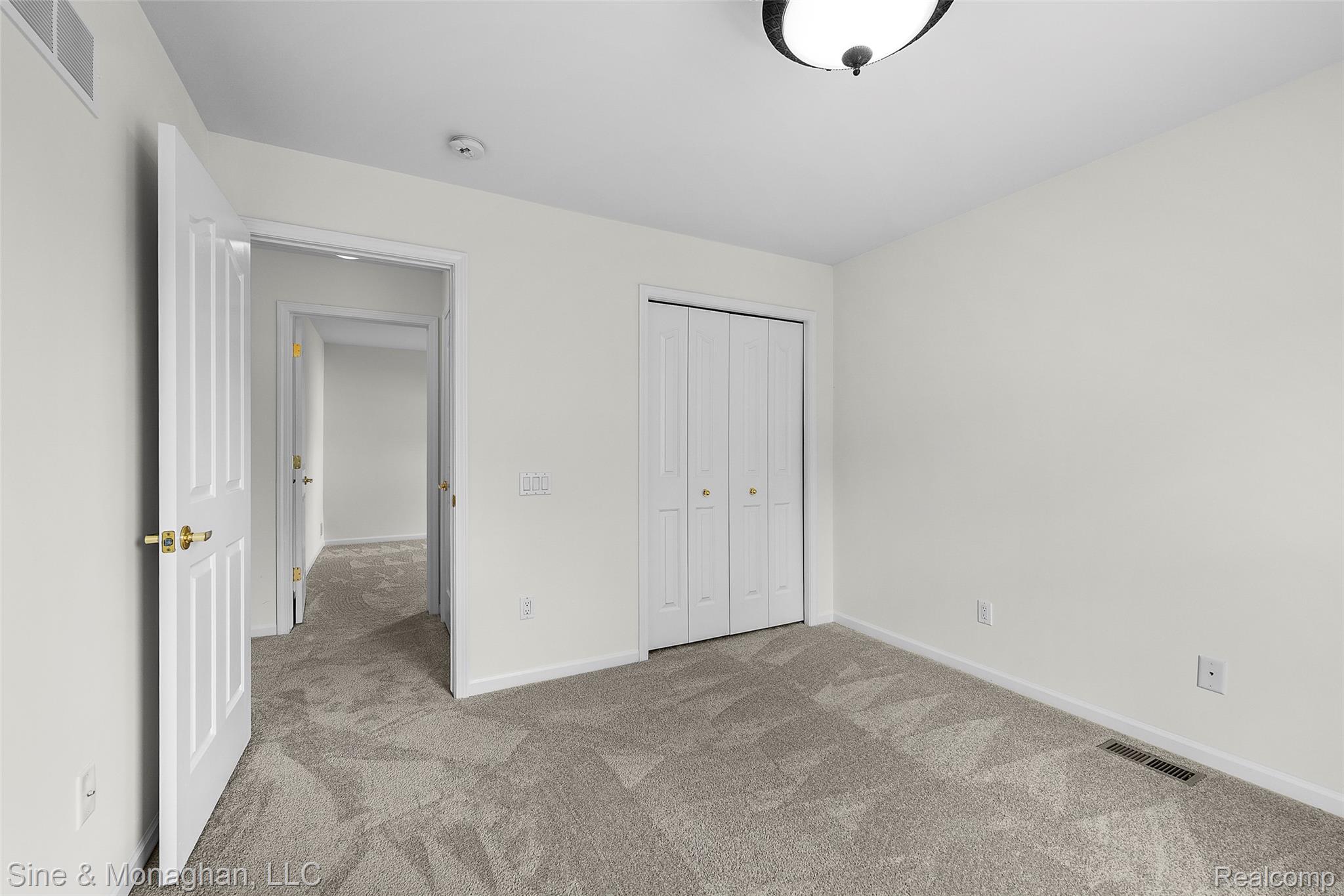 48322 Antique Road Canton, MI 48187 - Photo 33 of 45 Spacious room featuring neutral carpeting and light-colored walls