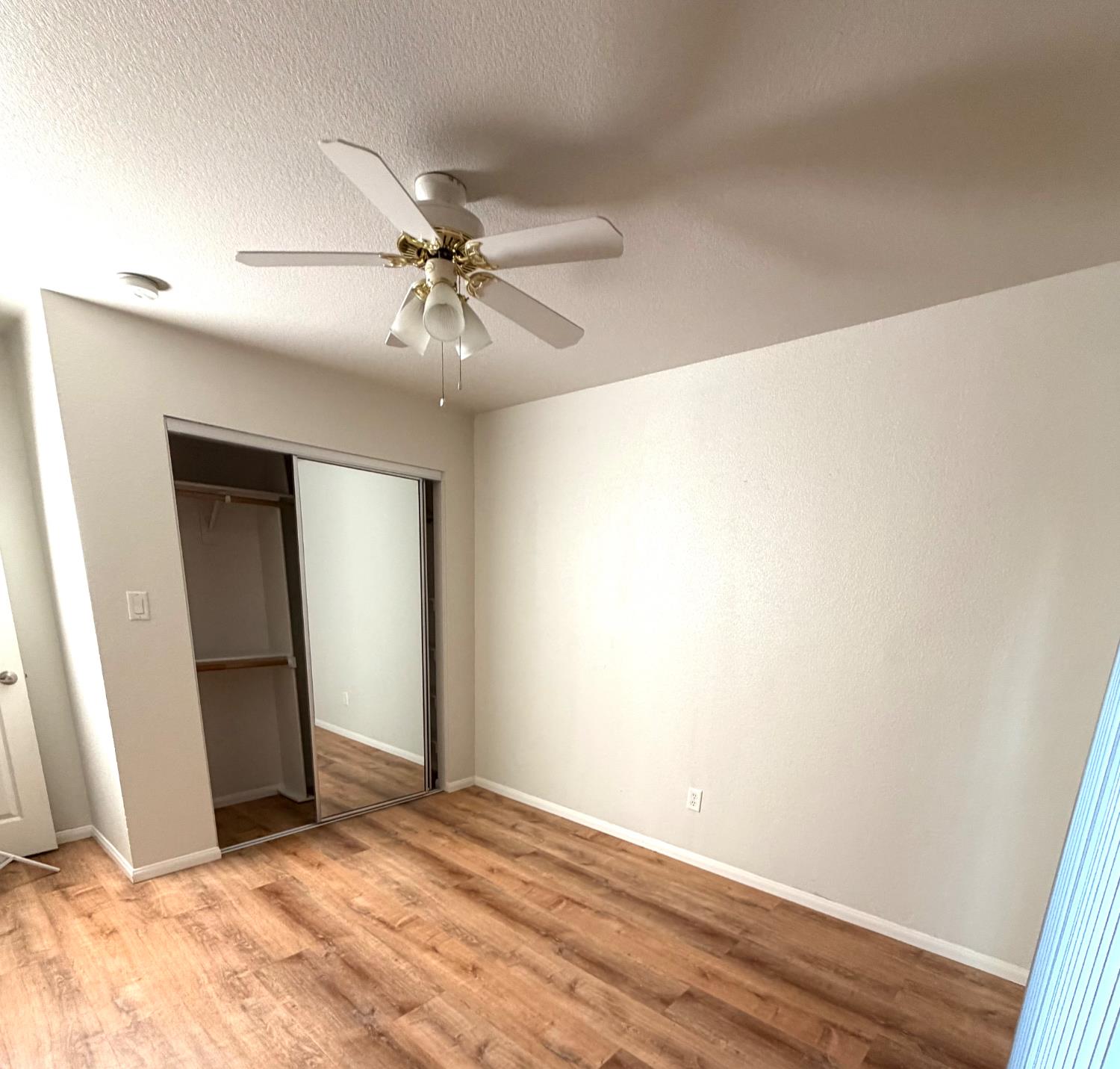 5000 Bremner Way, Unit 4 Sacramento, CA 95841 - Photo 14 of 23 a view of a big room with closet and fan