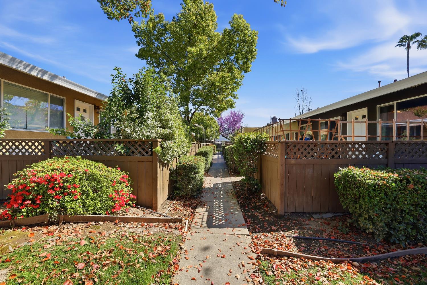 5000 Bremner Way, Unit 4 Sacramento, CA 95841 - Photo 18 of 23 a front view of a house with a yard