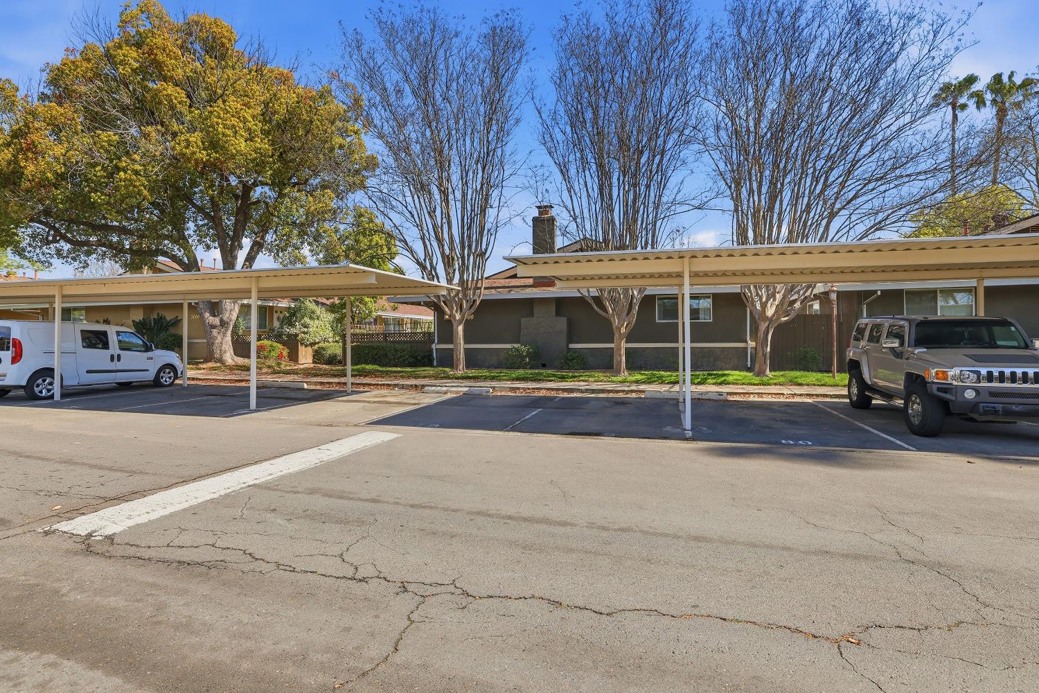 5000 Bremner Way, Unit 4 Sacramento, CA 95841 - Photo 20 of 23 a view of a building with a car parked beside it
