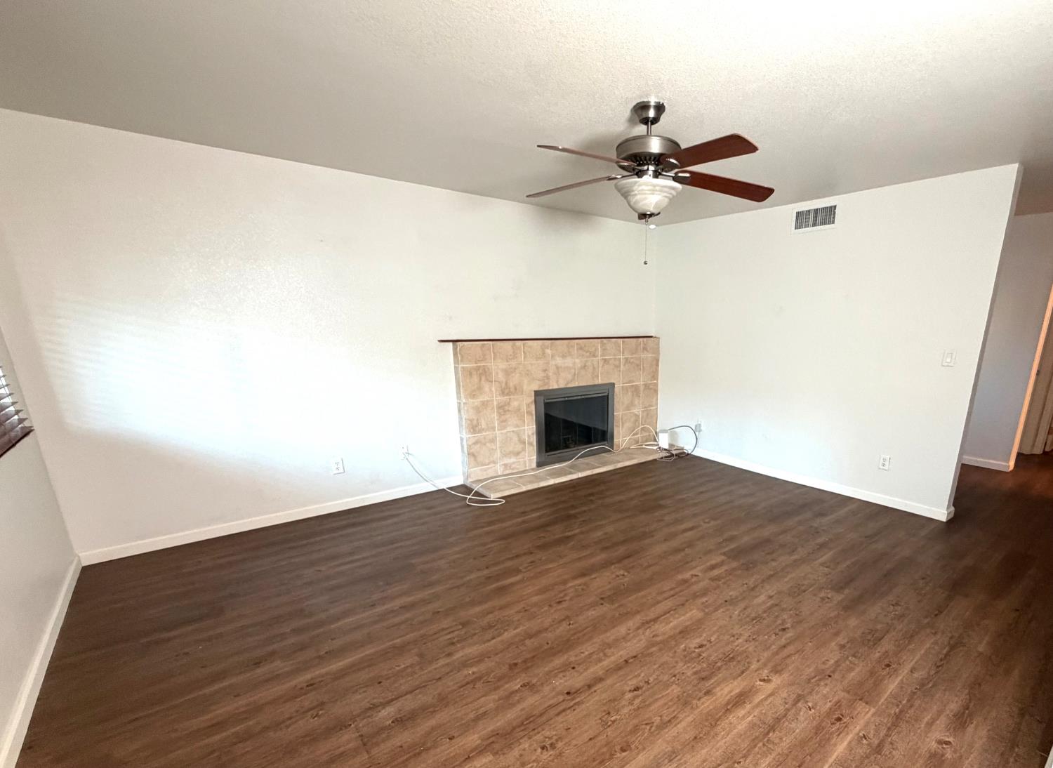 5000 Bremner Way, Unit 4 Sacramento, CA 95841 - Photo 6 of 23 a view of empty room with wooden floor
