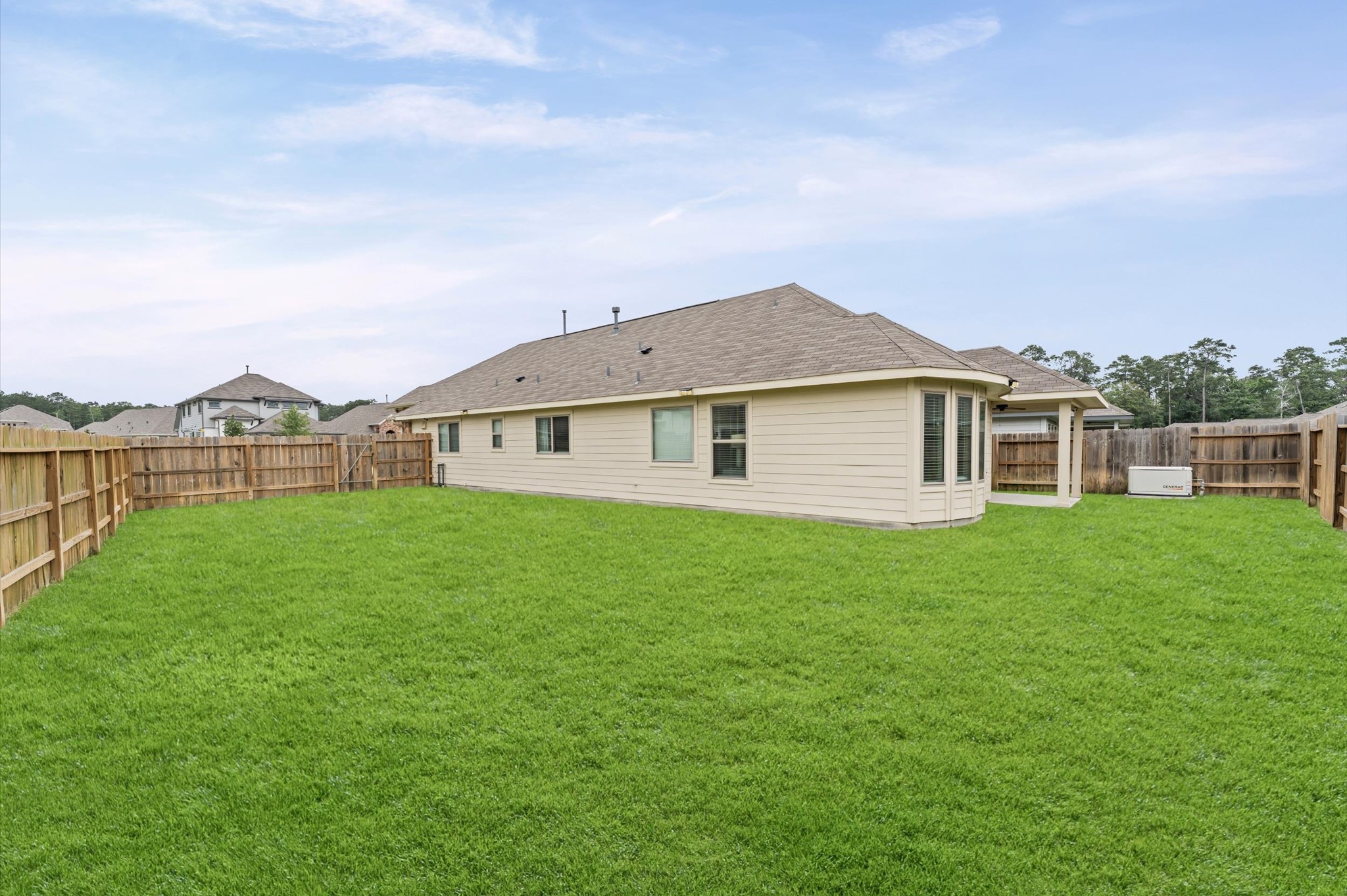 2702 Meadow View Lane Conroe, TX 77385 - Photo 21 of 26 a view of outdoor space yard and front view of a house