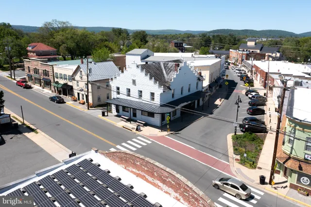 a view of a city that has tall buildings in the background