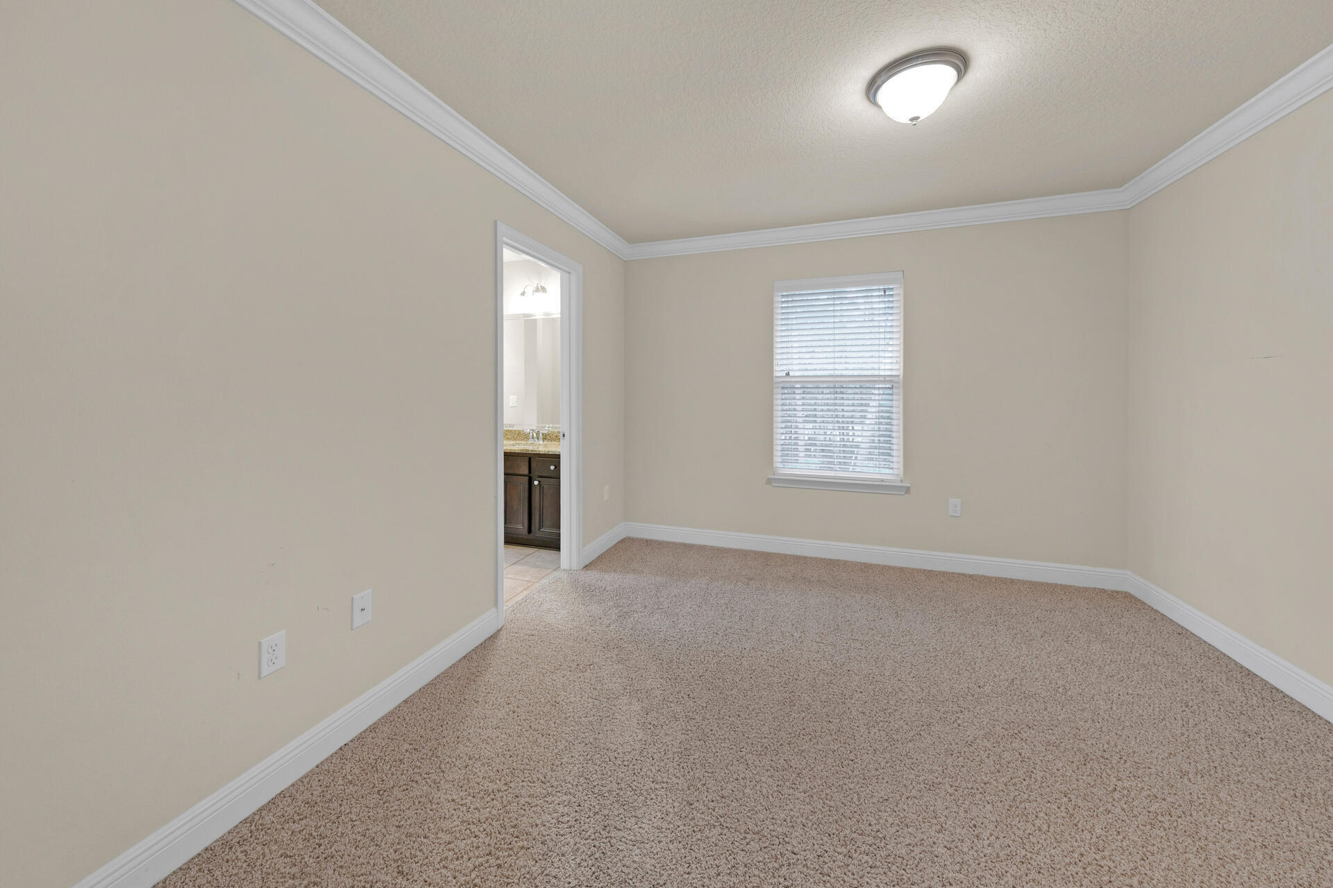 40 Horn Beam Way Santa Rosa Beach, FL 32459 - Photo 19 of 37 an empty room with windows and closet