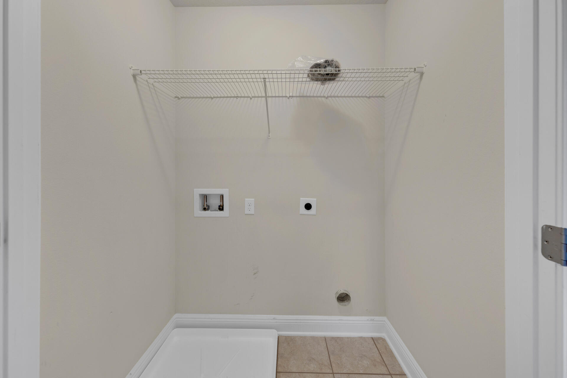 40 Horn Beam Way Santa Rosa Beach, FL 32459 - Photo 21 of 37 a view of a room with racks on the wall