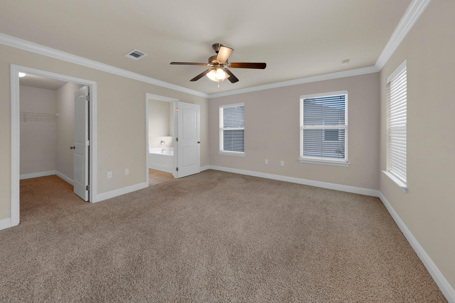 40 Horn Beam Way Santa Rosa Beach, FL 32459 - Photo 22 of 37 a view of a livingroom with a ceiling fan and window