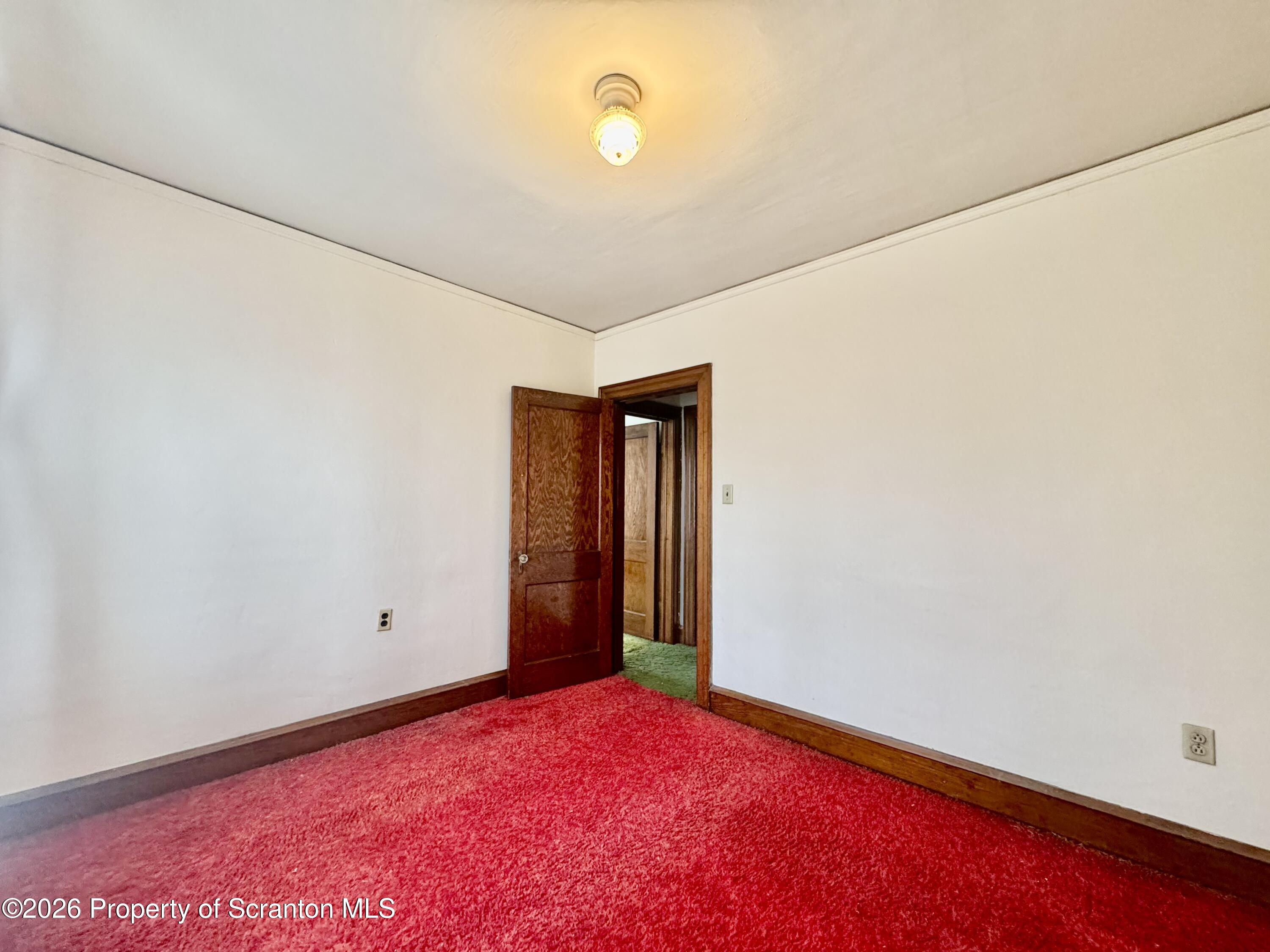 2120 Myrtle Street Scranton, PA 18510 - Photo 27 of 42 an empty room with windows and closet