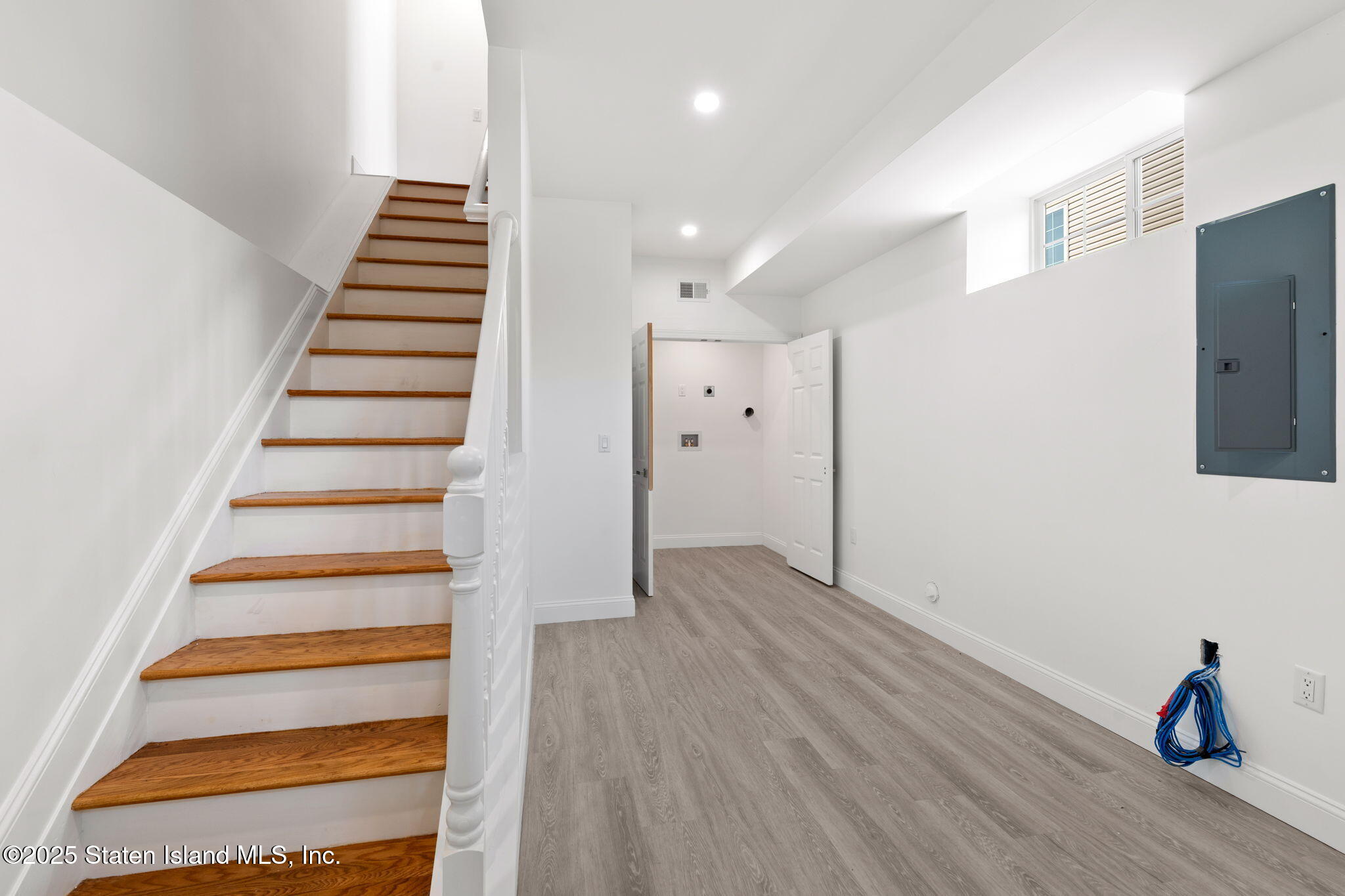 1384 Clove Road Staten Island, NY 10301 - Photo 29 of 51 a view of entryway with wooden floor