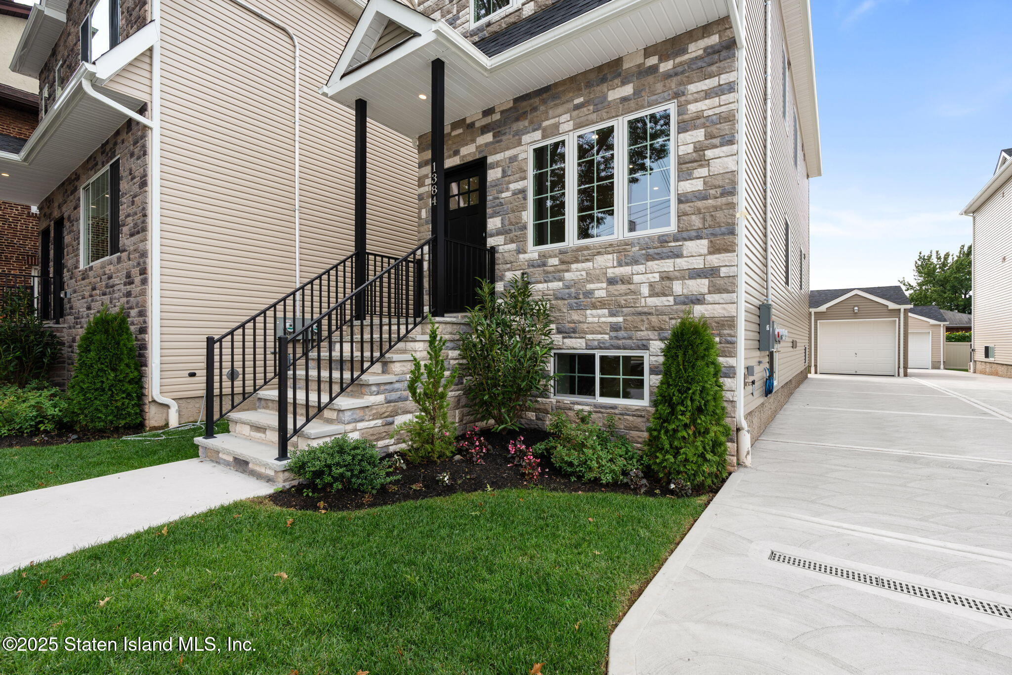 1384 Clove Road Staten Island, NY 10301 - Photo 3 of 51 a front view of house with yard and green space