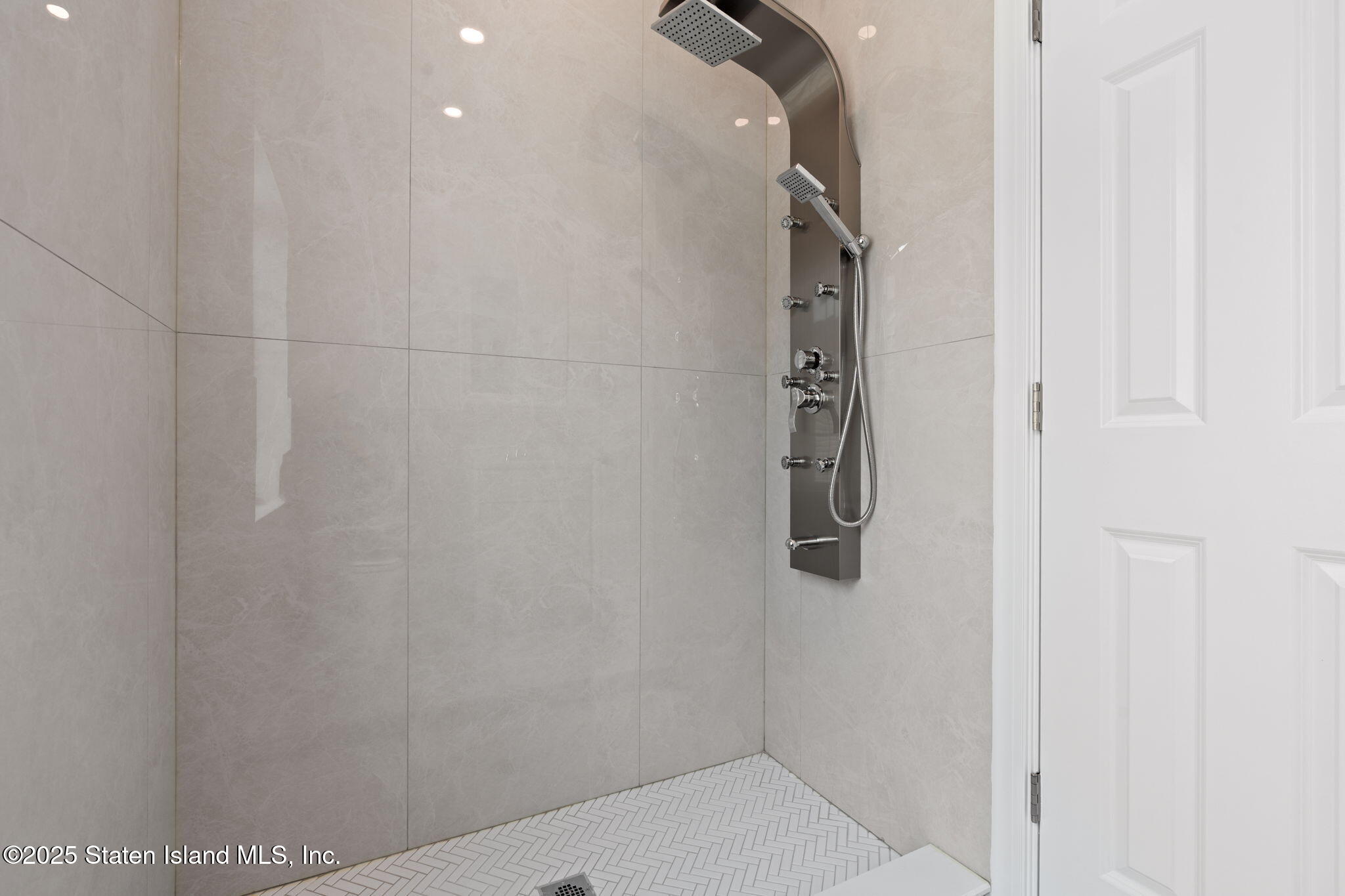 1384 Clove Road Staten Island, NY 10301 - Photo 33 of 51 a bathroom with a shower