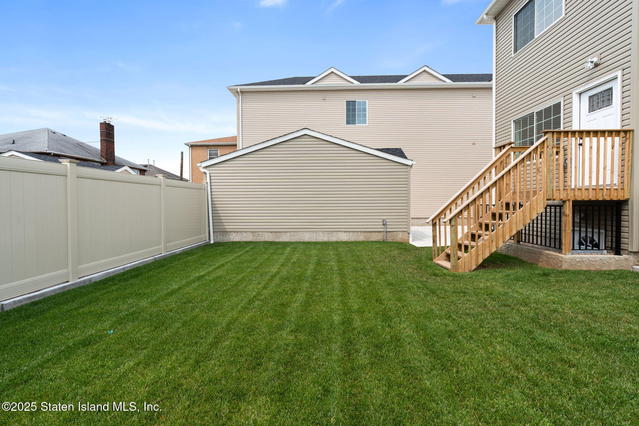 1384 Clove Road Staten Island, NY 10301 - Photo 41 of 51 a view of a house with a yard