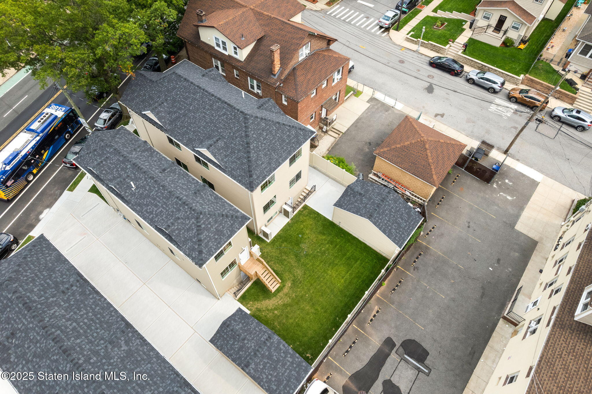 1384 Clove Road Staten Island, NY 10301 - Photo 42 of 51 an aerial view of a house with a yard