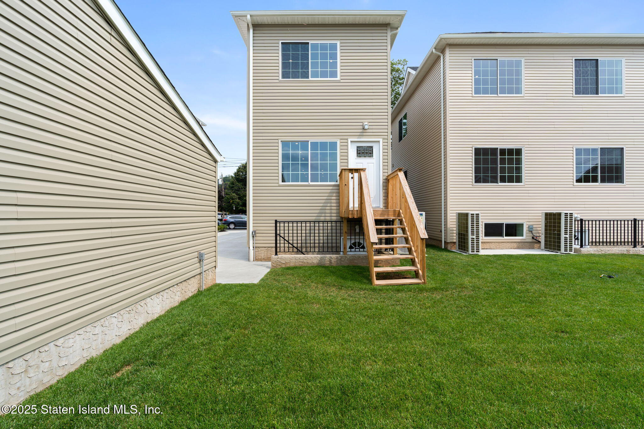 1384 Clove Road Staten Island, NY 10301 - Photo 44 of 51 a view of a house with a backyard