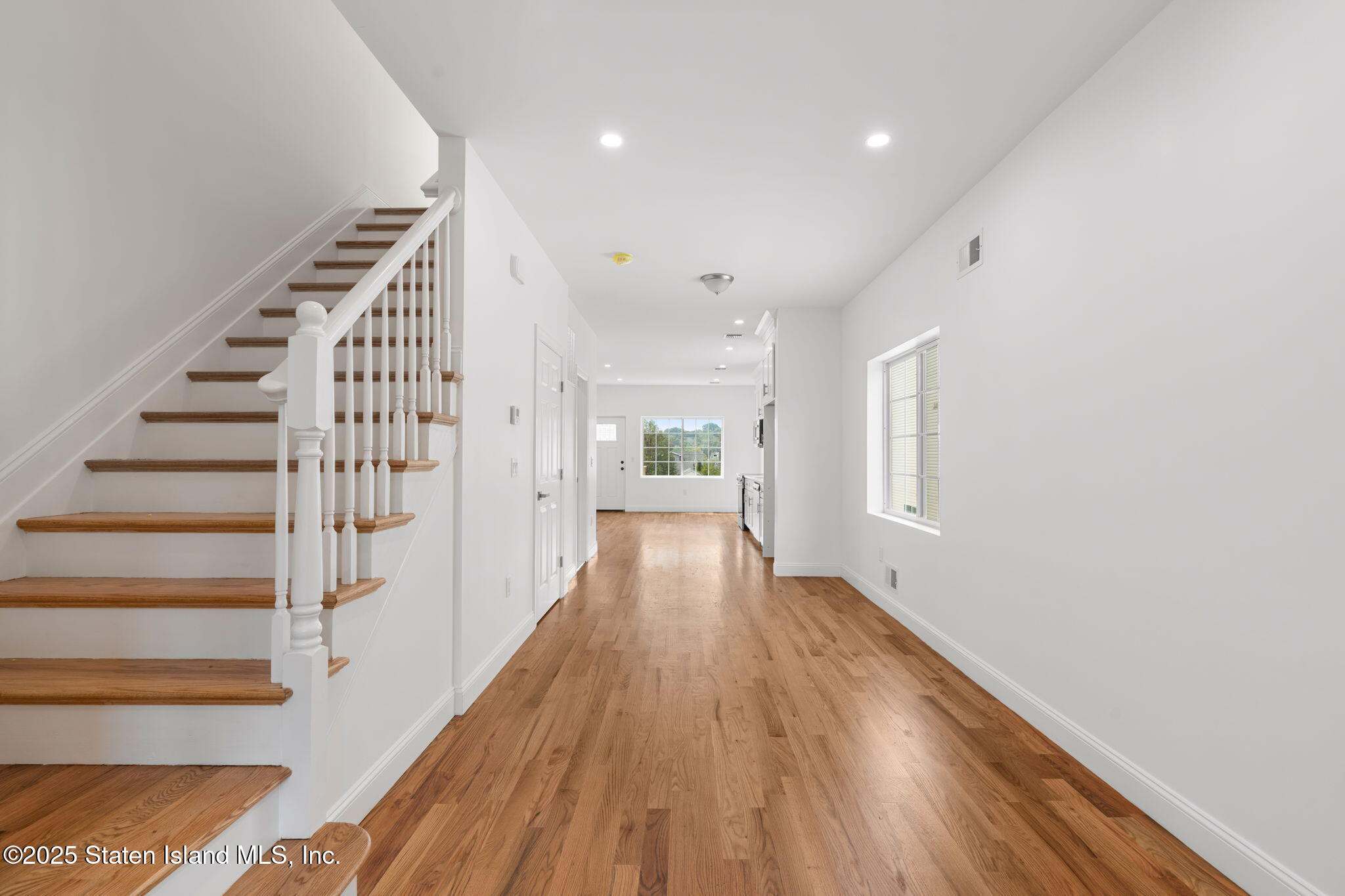 1384 Clove Road Staten Island, NY 10301 - Photo 6 of 51 a view of entryway with wooden floor