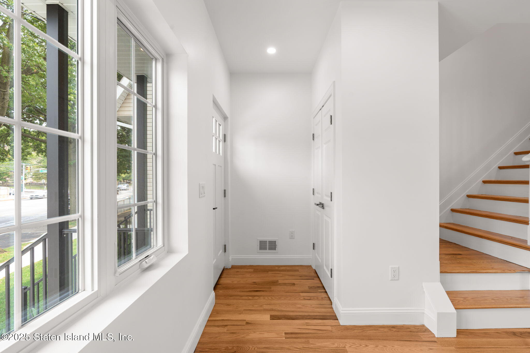 1384 Clove Road Staten Island, NY 10301 - Photo 8 of 51 a view of a bathroom with sink and glass door