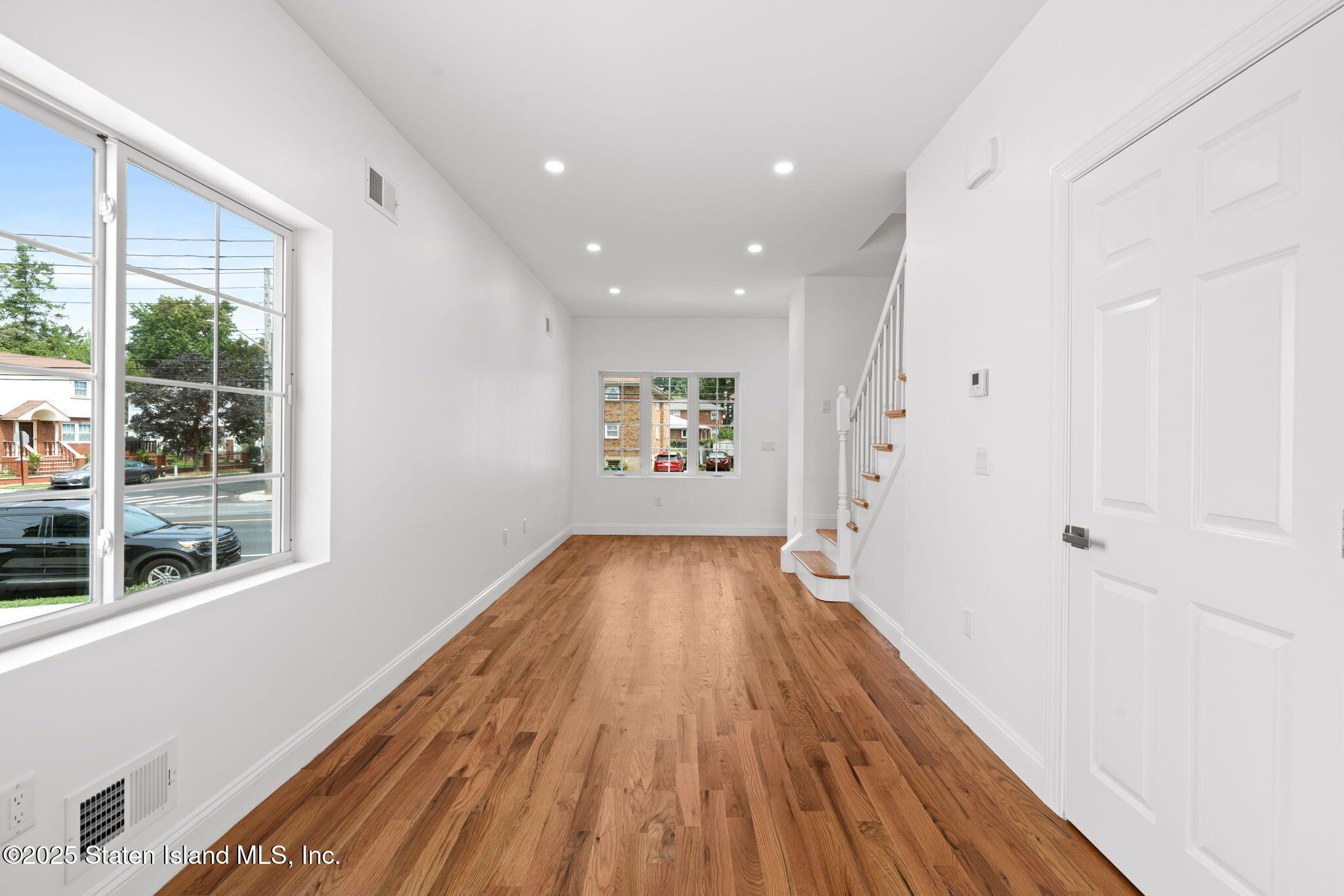 1384 Clove Road Staten Island, NY 10301 - Photo 9 of 51 a view of entryway with wooden floor