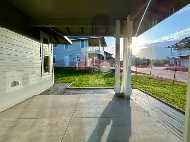 a view of a porch with wooden floor