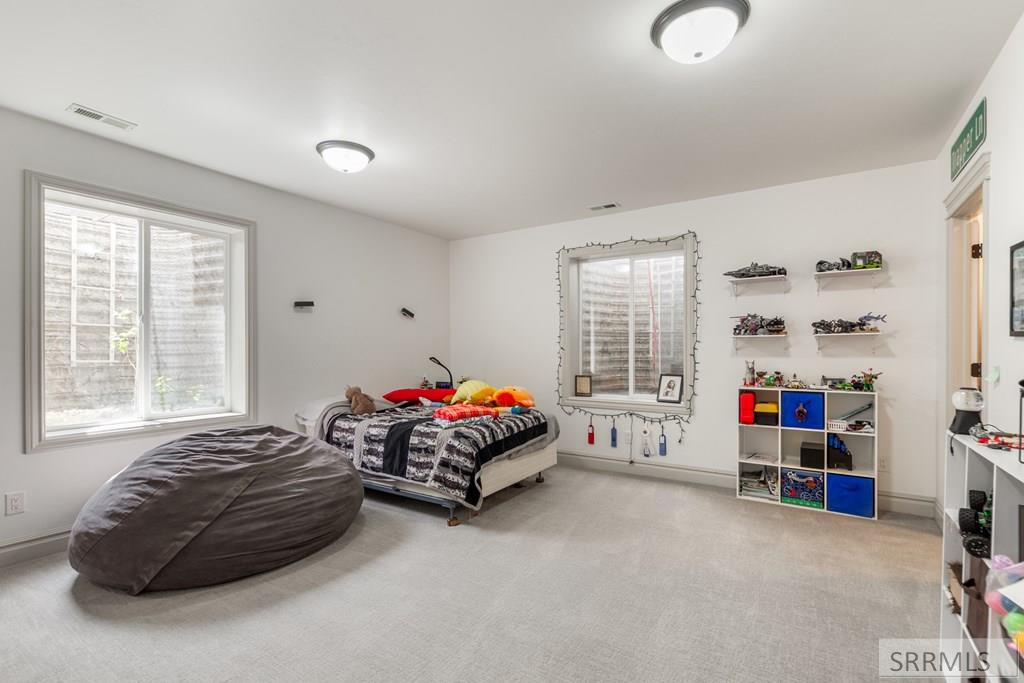 6568 Middle Fork Road Idaho Falls, ID 83406 - Photo 29 of 52 Basement bedroom