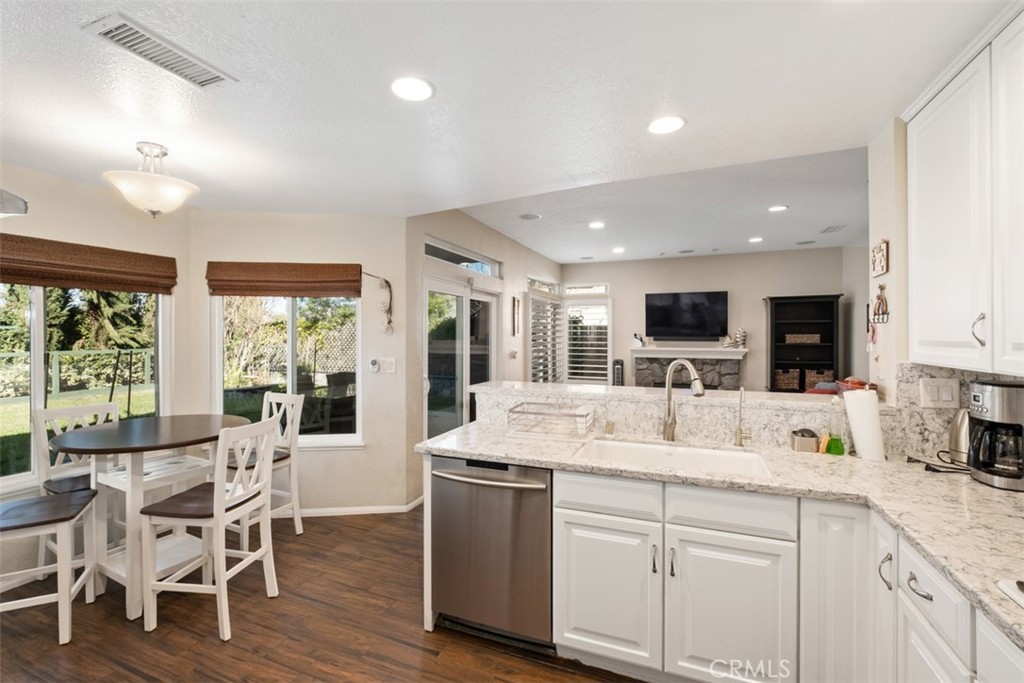 20891 Porter Ranch Road Rancho Santa Margarita, CA 92679 - Photo 14 of 40 a large kitchen with kitchen island a large island a sink and appliances