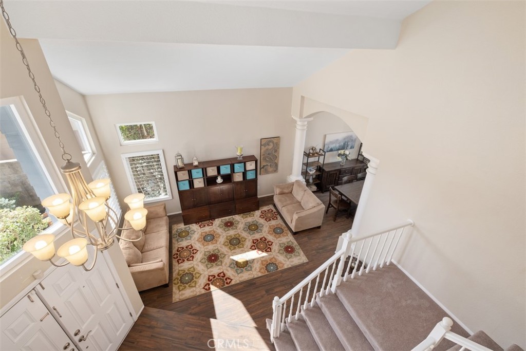20891 Porter Ranch Road Rancho Santa Margarita, CA 92679 - Photo 19 of 40 a living room with furniture and a wooden floor