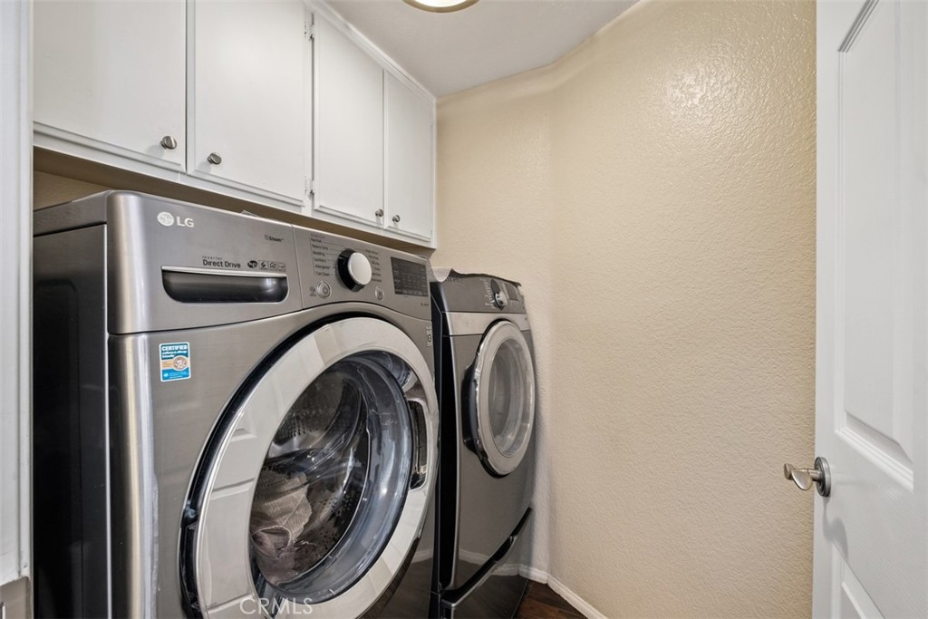 20891 Porter Ranch Road Rancho Santa Margarita, CA 92679 - Photo 29 of 40 a utility room with dryer and washer