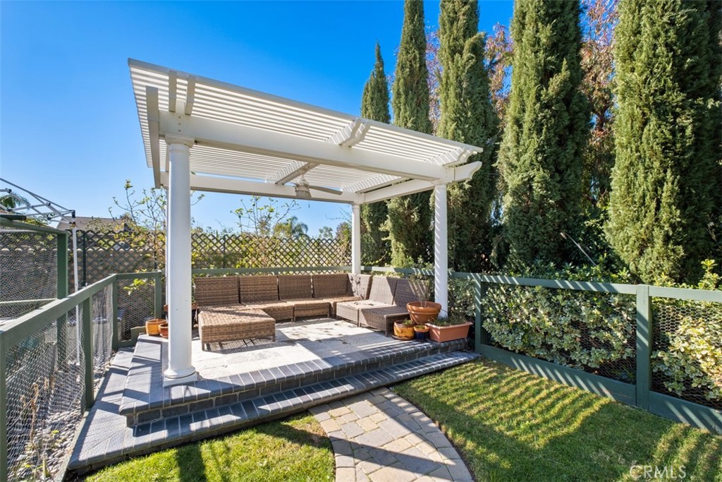20891 Porter Ranch Road Rancho Santa Margarita, CA 92679 - Photo 34 of 40 a view of a patio with a table chairs and a patio