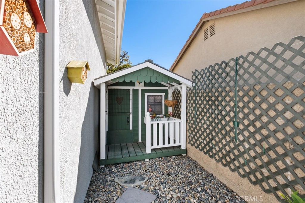 20891 Porter Ranch Road Rancho Santa Margarita, CA 92679 - Photo 36 of 40 a front view of a house with parking