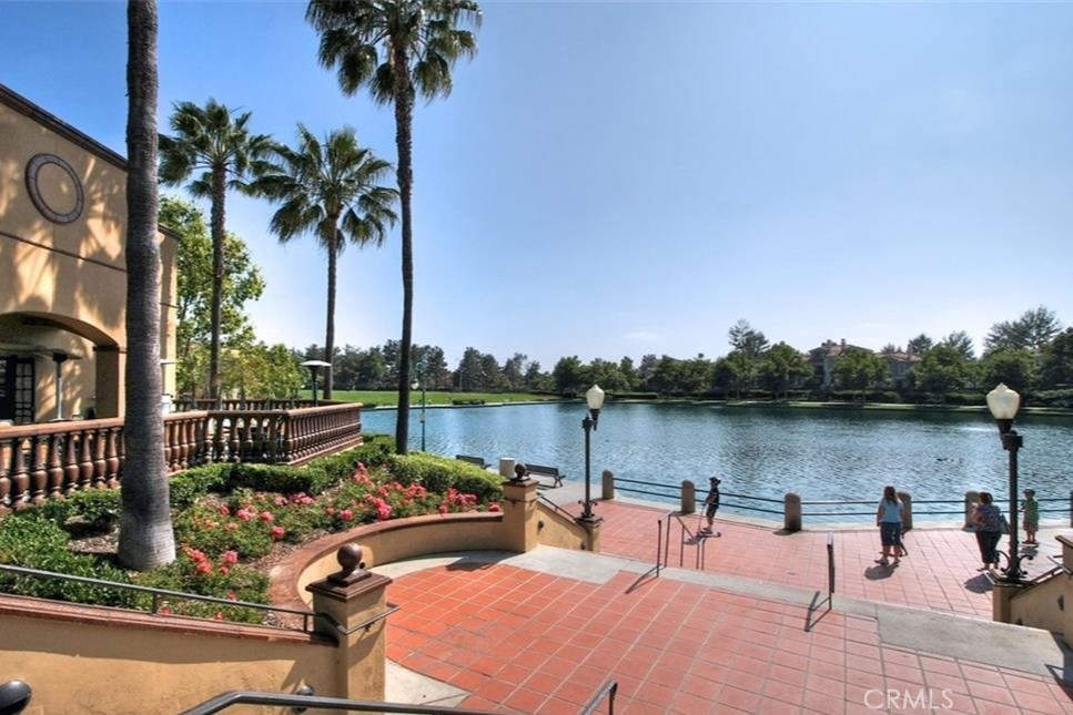 20891 Porter Ranch Road Rancho Santa Margarita, CA 92679 - Photo 41 of 63 a view of a lake with couches chairs