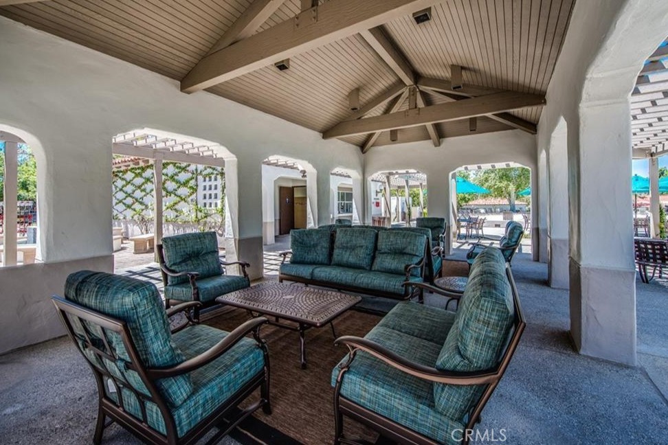 20891 Porter Ranch Road Rancho Santa Margarita, CA 92679 - Photo 55 of 63 a living room with furniture and a large window
