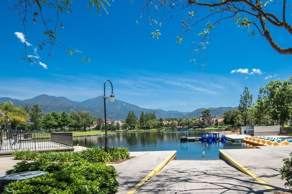 20891 Porter Ranch Road Rancho Santa Margarita, CA 92679 - Photo 56 of 63 a view of a lake with a house