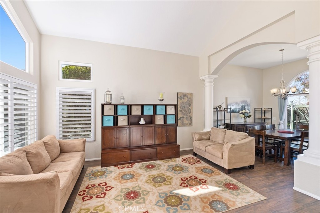 20891 Porter Ranch Road Rancho Santa Margarita, CA 92679 - Photo 6 of 40 a living room with furniture and a couch