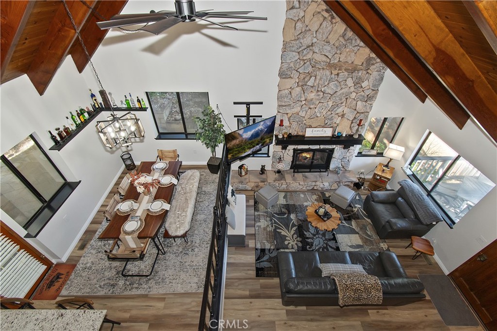 198 Zermatt Drive Crestline, CA 92325 - Photo 22 of 54 a view of living room with furniture and wooden floor