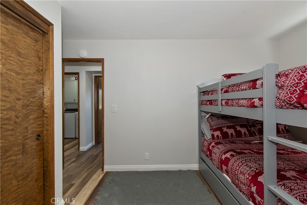 198 Zermatt Drive Crestline, CA 92325 - Photo 26 of 54 a view of a room that has a bed and a window in it