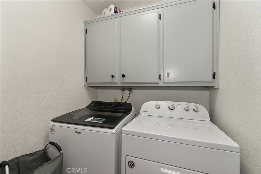 198 Zermatt Drive Crestline, CA 92325 - Photo 35 of 54 a utility room with dryer and washer