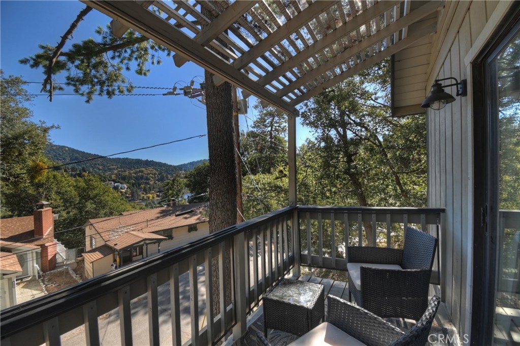 198 Zermatt Drive Crestline, CA 92325 - Photo 36 of 54 a view of a chair and table in the balcony