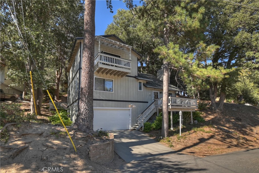 198 Zermatt Drive Crestline, CA 92325 - Photo 42 of 54 a front view of a house with street