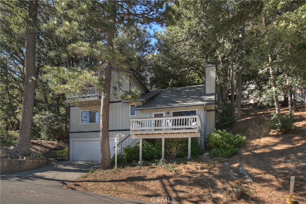198 Zermatt Drive Crestline, CA 92325 - Photo 43 of 54 front view of a building with a tree