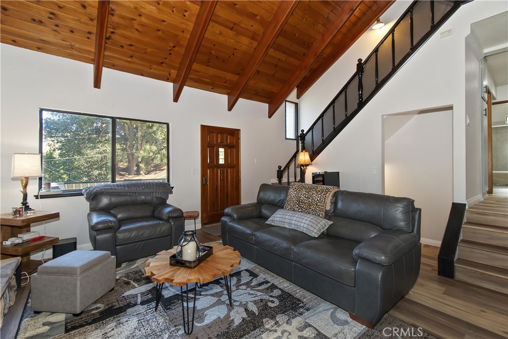198 Zermatt Drive Crestline, CA 92325 - Photo 9 of 54 a living room with furniture and a large window