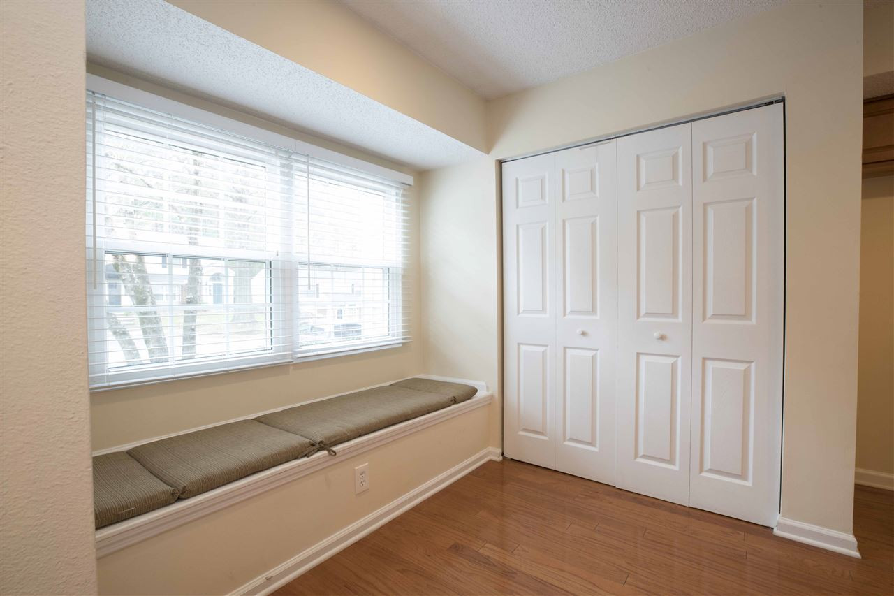7702 Falcon Rest Circle, Unit X Raleigh, NC 27615 - Photo 4 of 27 Cozy window seat in kitchen