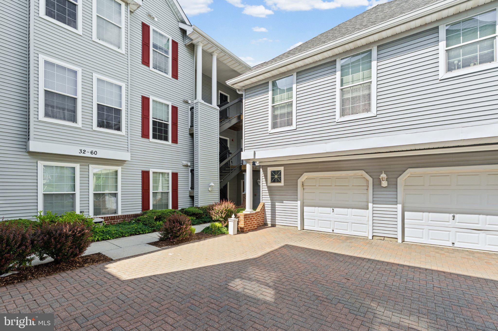 36 Hawk Rise Lane, Unit 104 Owings Mills, MD 21117 - Photo 2 of 25 Charming residential complex entrance.